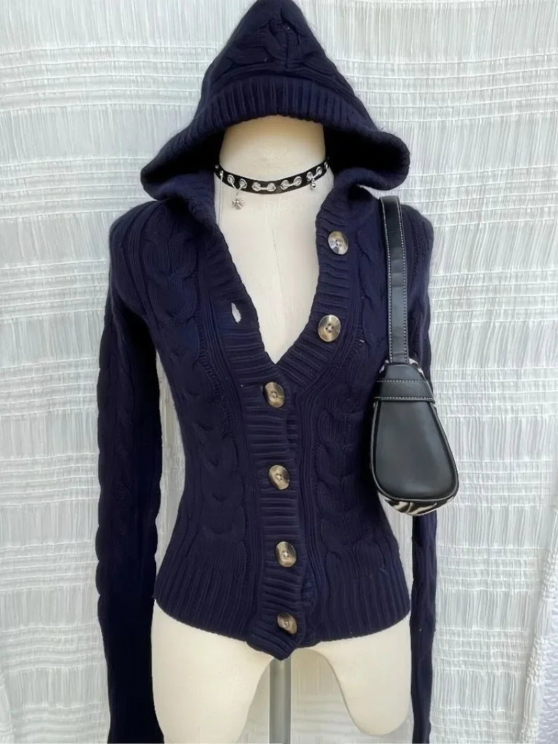 Navy hooded cable-knit cardigan on a mannequin with the hood up, showing the slim fit