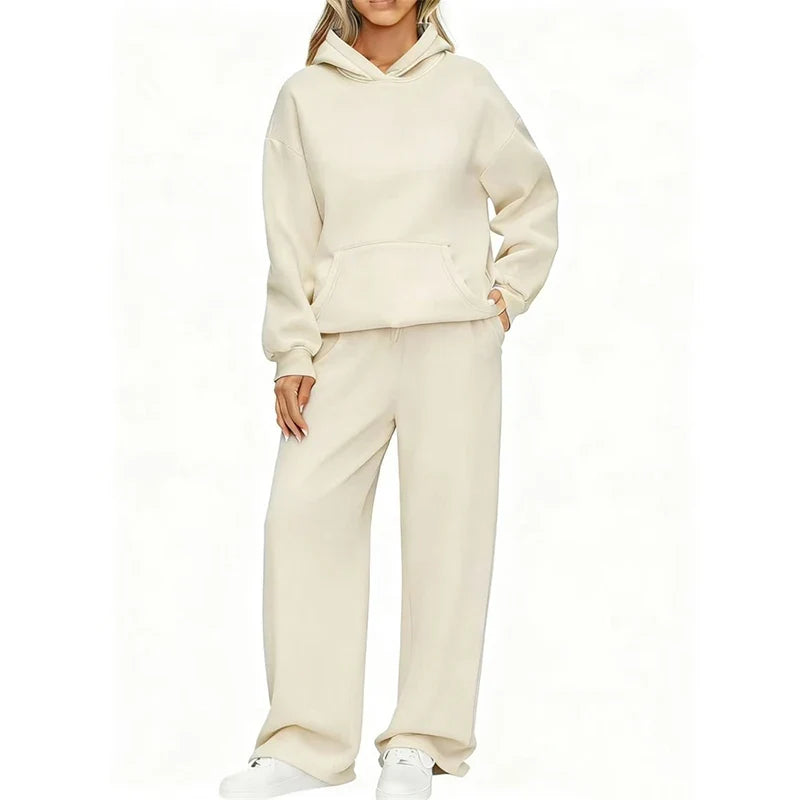 Model in cream oversized hoodie and wide-leg sweatpants set, front view