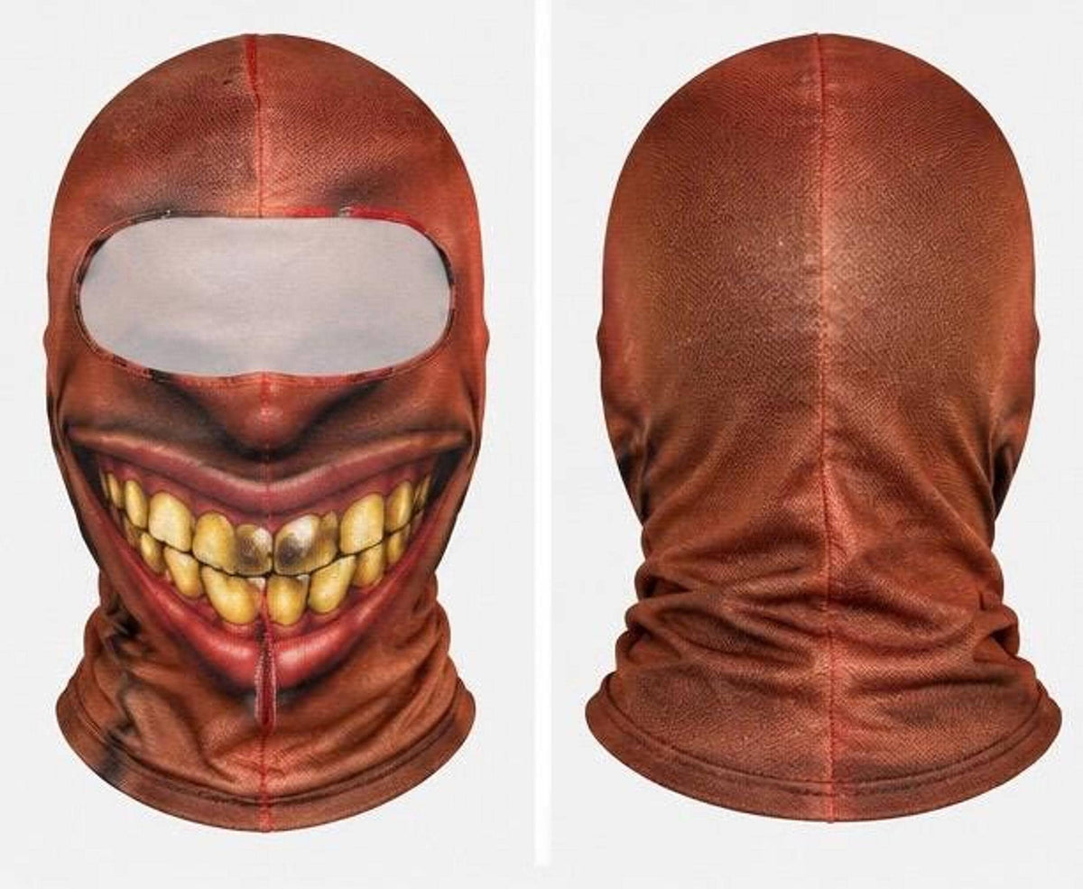Front and back flat product views of a brown fabric balaclava featuring a printed realistic grinning mouth graphic with discolored teeth and an oval eye opening.