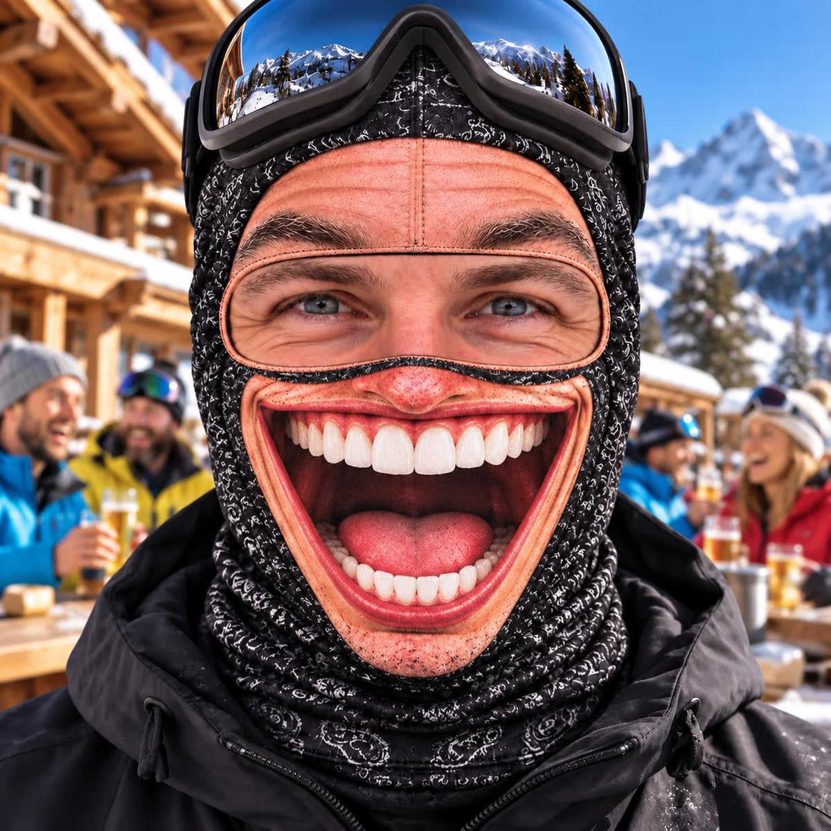 May include: A black balaclava featuring a realistic graphic print of a wide, smiling mouth with white teeth and a pink tongue. The headgear is worn with dark ski goggles that have a reflective lens, and it is paired with a black hooded jacket.