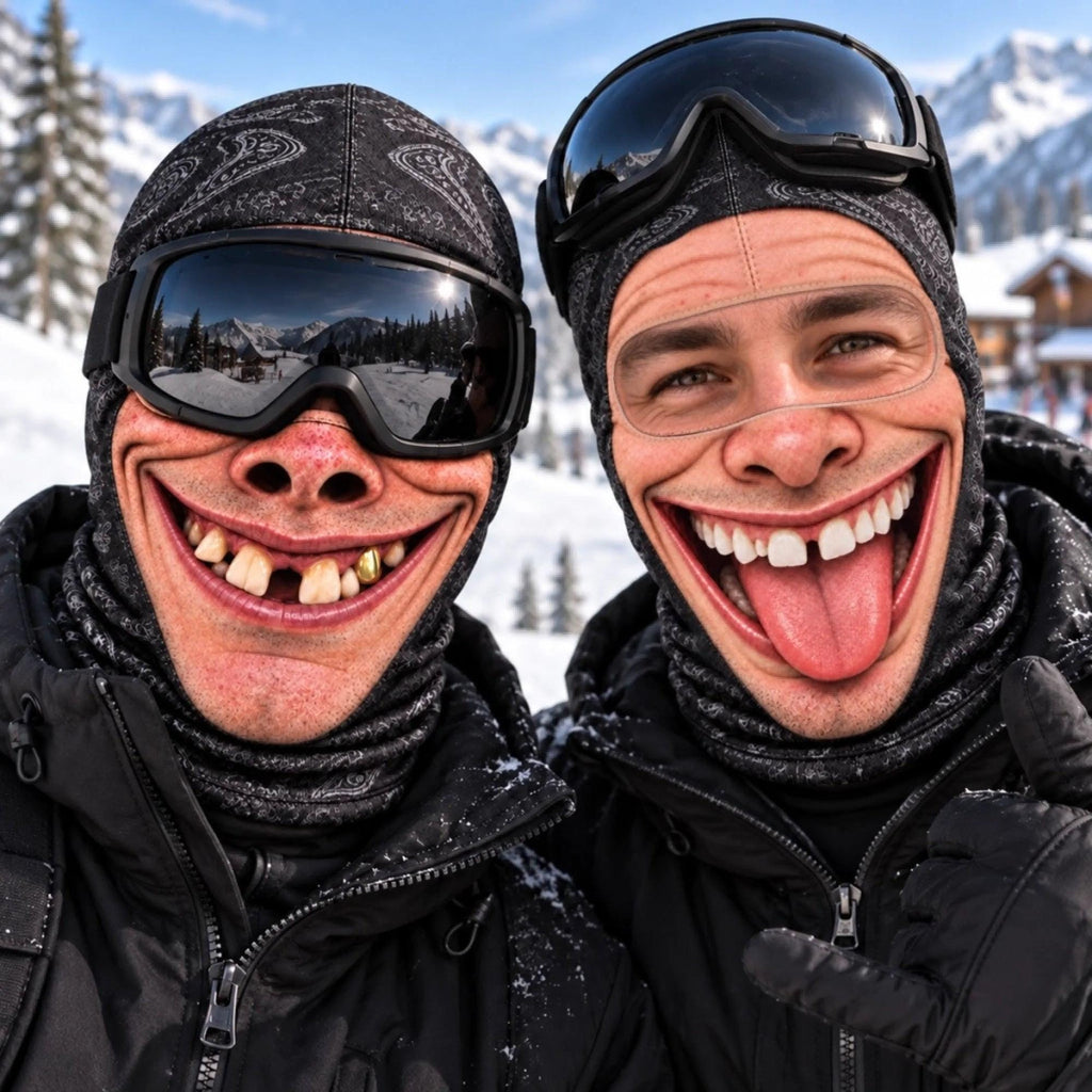 May include: Two individuals wearing black paisley-patterned balaclavas and black ski goggles. One individual has a gold tooth and a wide, exaggerated grin. The other individual has a wide, open-mouthed grin with a visible tongue and a gap between teeth.