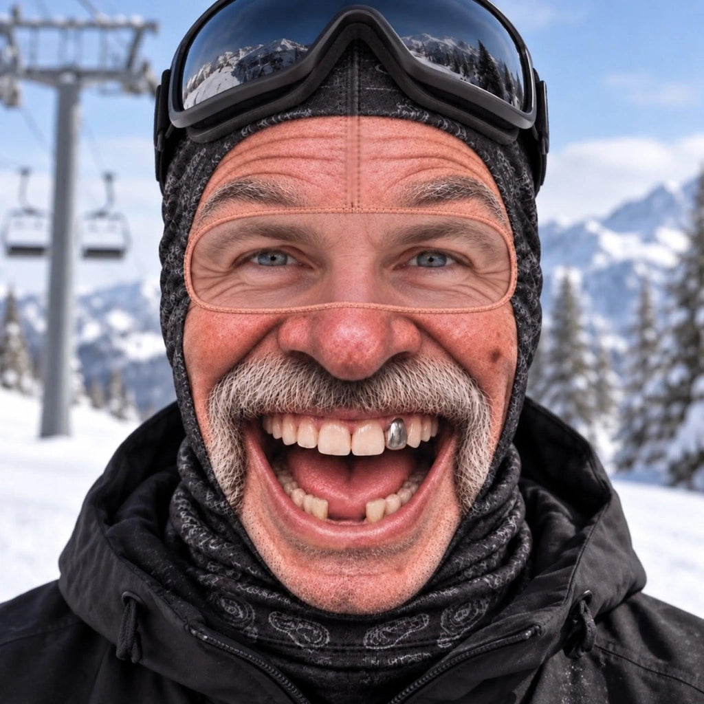 May include: A dark gray and black patterned balaclava worn under black ski goggles. The balaclava features a single large opening for the eyes and nose. The fabric has a textured, heathered appearance, providing full coverage for the head and neck.