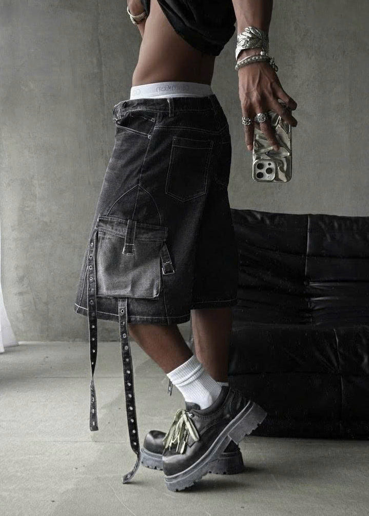 CARTWHEEL set featuring a black tie-dye top and cropped shorts with lace-up detail.